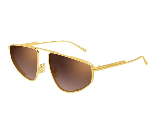 Gold-framed sunglasses with brown lenses on a white background