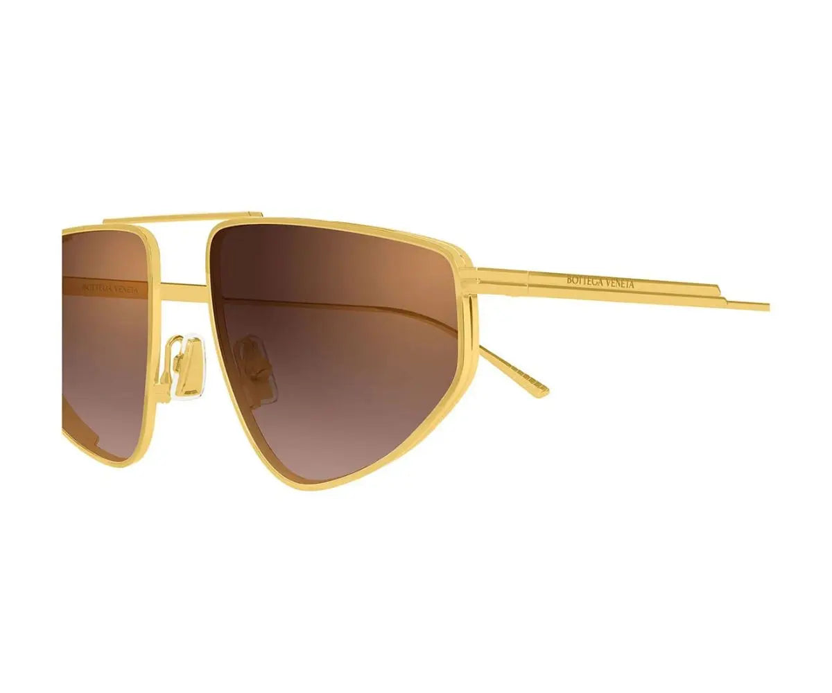 Gold-framed sunglasses with brown lenses on a white background