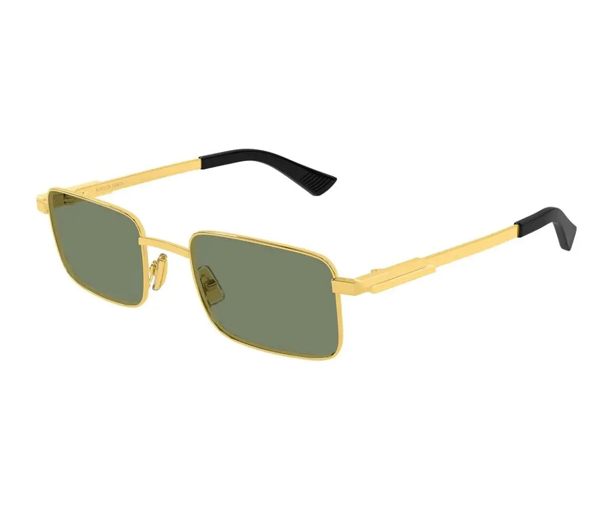 Gold-framed sunglasses with green lenses on a white background