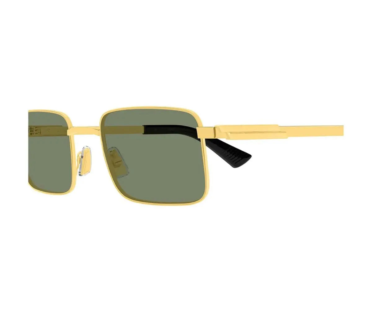 Gold-framed sunglasses with green lenses on a white background