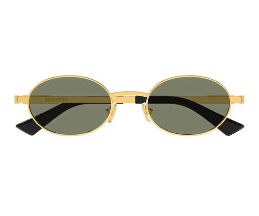 Gold-framed sunglasses with dark lenses on a white background