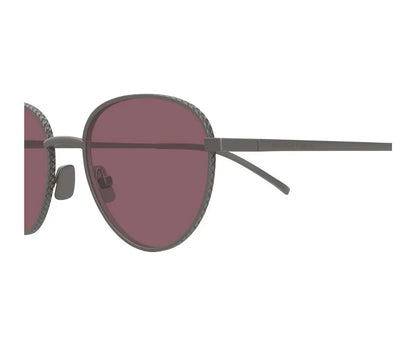 Sunglasses with dark lenses and thin frame on a white background