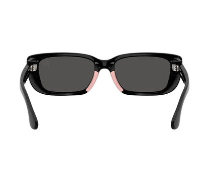 Black sunglasses with dark lenses on a white background