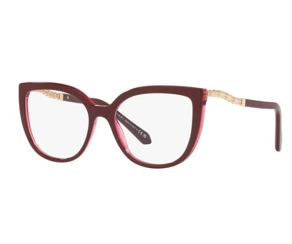 Red cat-eye glasses with gold accents on a white background