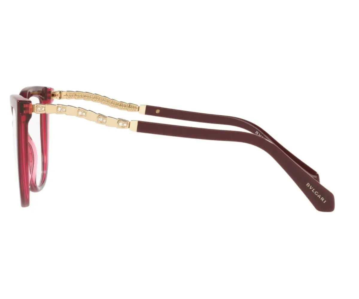 Glasses with gold frame and brown arms on a white background