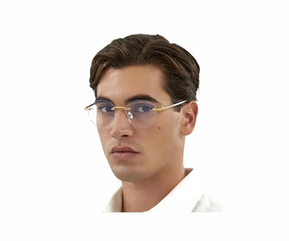 Man wearing gold-rimmed glasses on a white background
