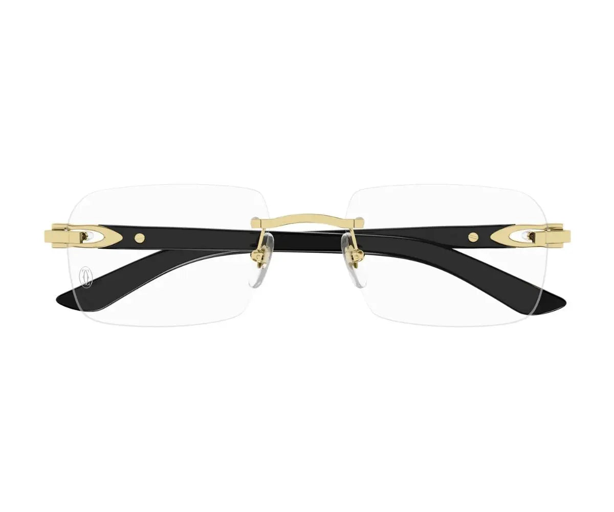 Black rimless eyeglasses with gold accents on a white background