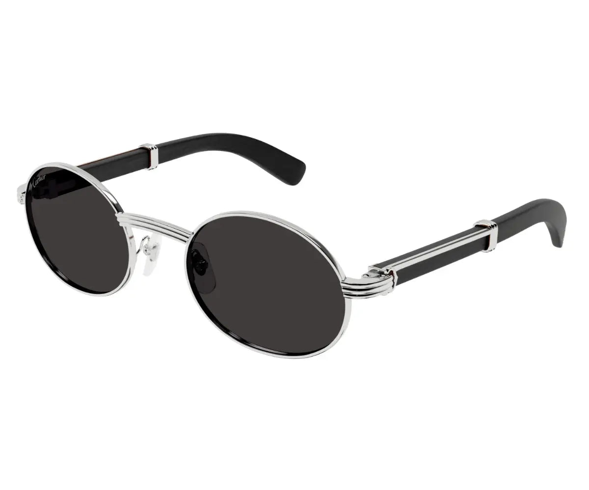 Sunglasses with oval lenses and black frames on a white background