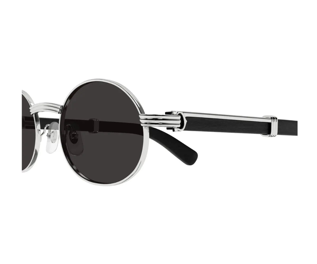 Round sunglasses with black lenses and silver frames on a white background