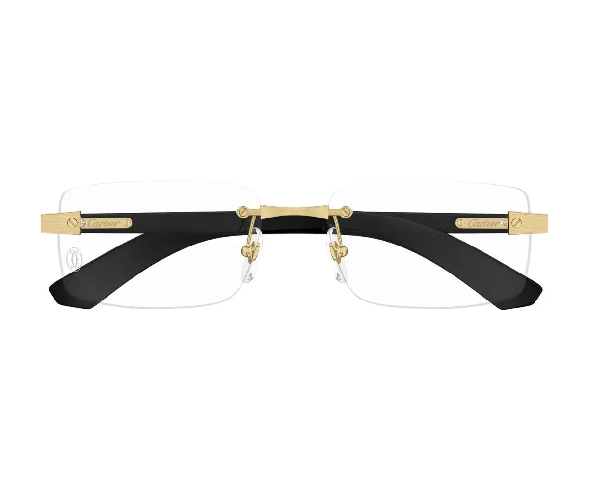 Black and gold eyeglasses on a white background