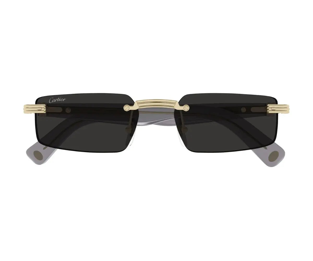 Sunglasses with gold frame and black lenses on a white background