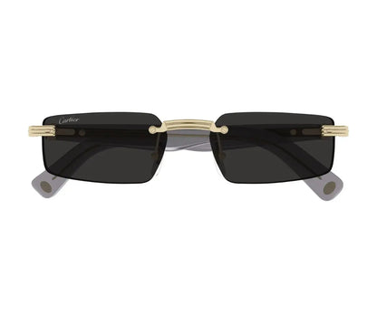 Sunglasses with gold frame and black lenses on a white background