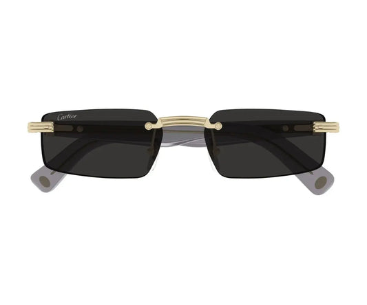 Sunglasses with gold frame and black lenses on a white background