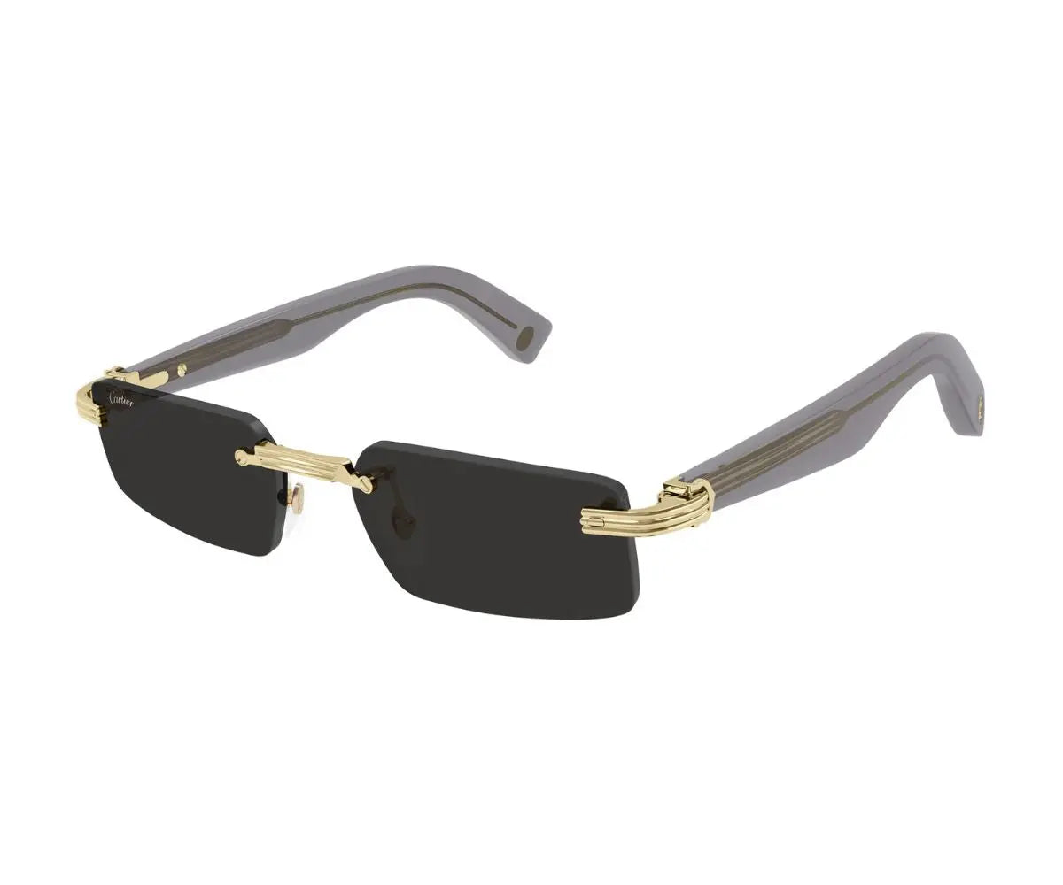 Sunglasses with gold frame and black lenses on a white background