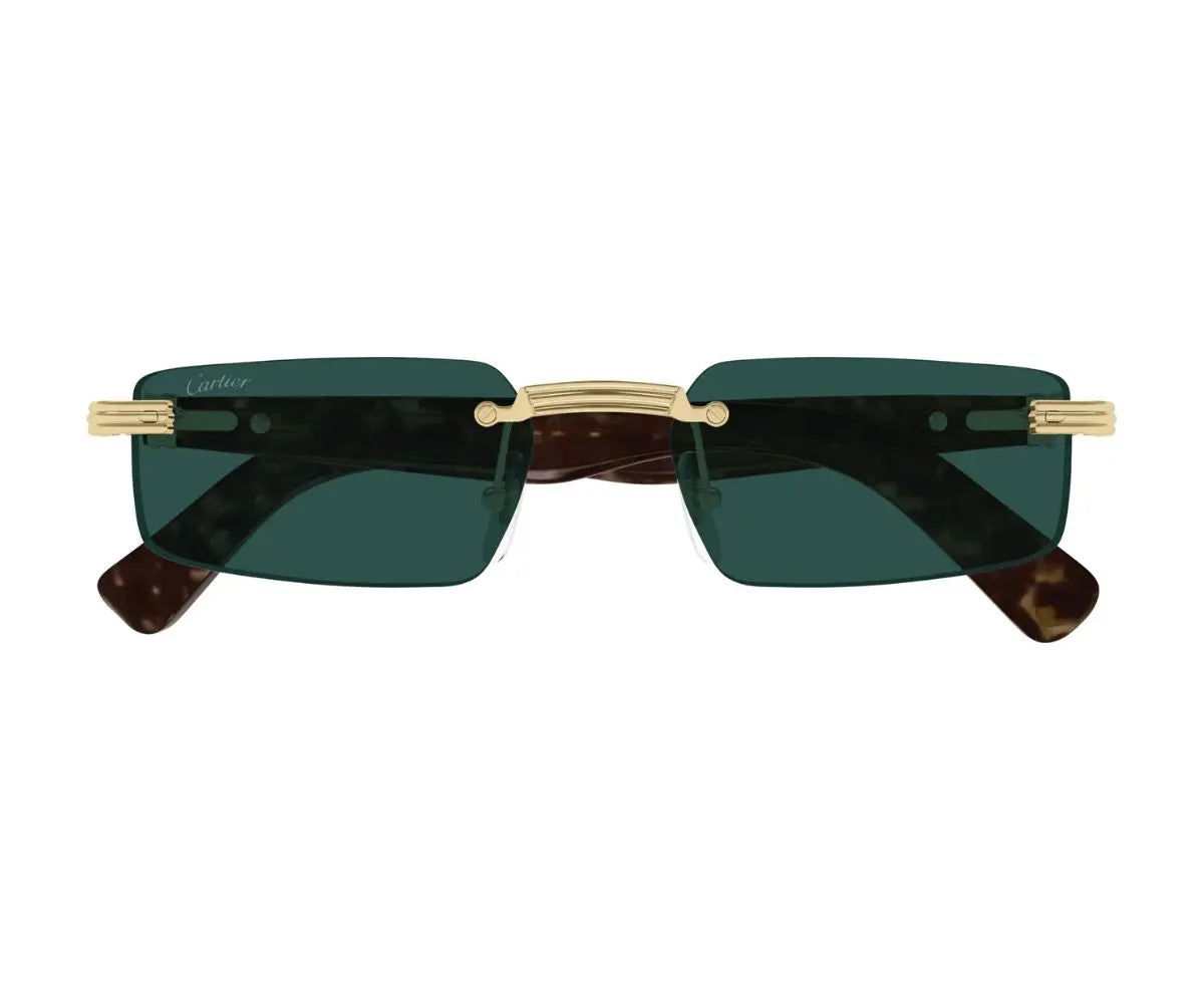 Sunglasses with gold frames and green lenses on a white background