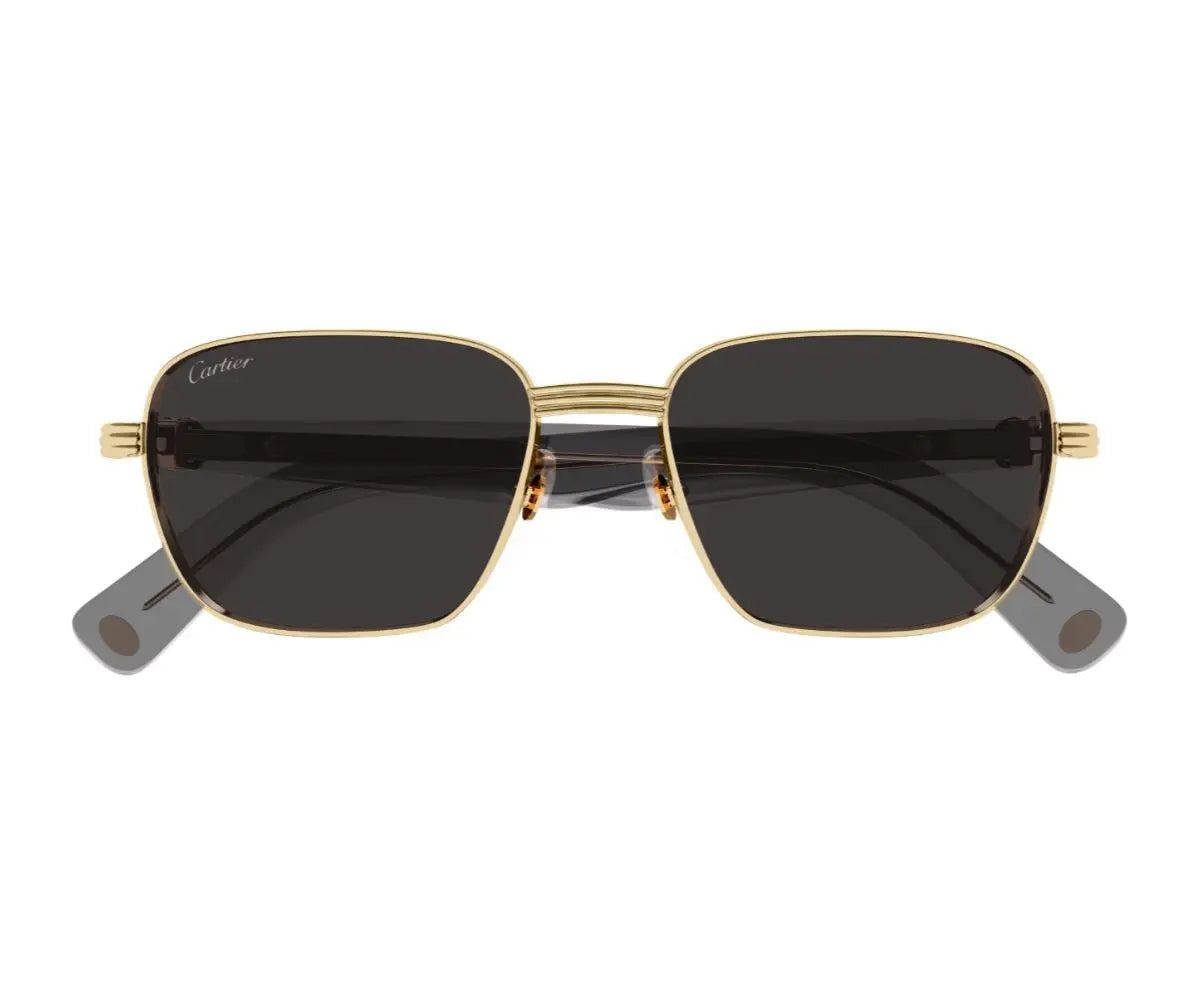 Gold-framed sunglasses with dark lenses on a white background