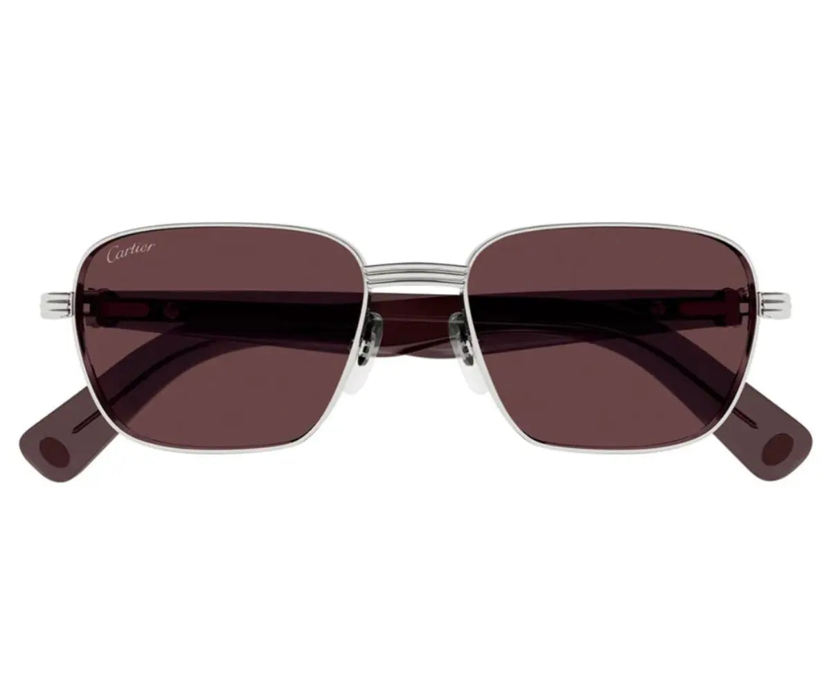 Sunglasses with brown lenses and silver frames on a white background