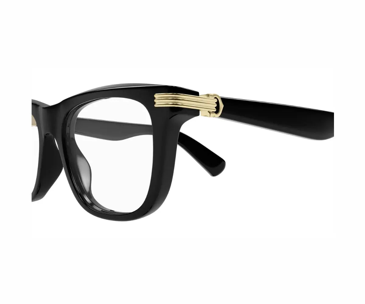 Black eyeglasses with gold accents on a white background