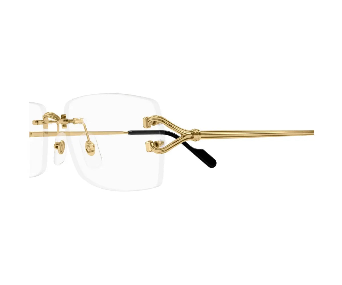 Gold-rimmed eyeglasses on a white background
