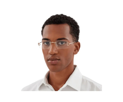Man wearing glasses and a white shirt on a white background
