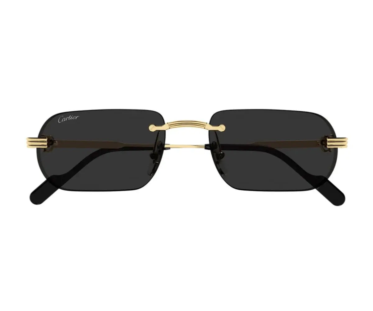 Sunglasses with gold frames and black lenses on a white background