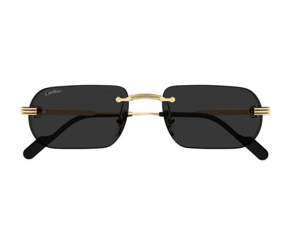 Sunglasses with gold frames and black lenses on a white background