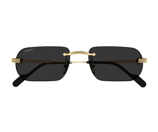 Sunglasses with gold frames and black lenses on a white background