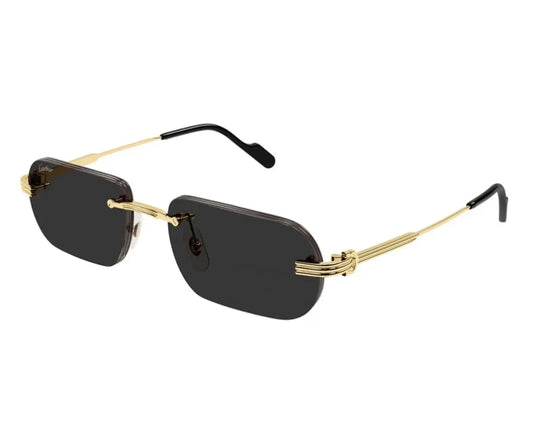 Sunglasses with gold frames and black lenses on a white background