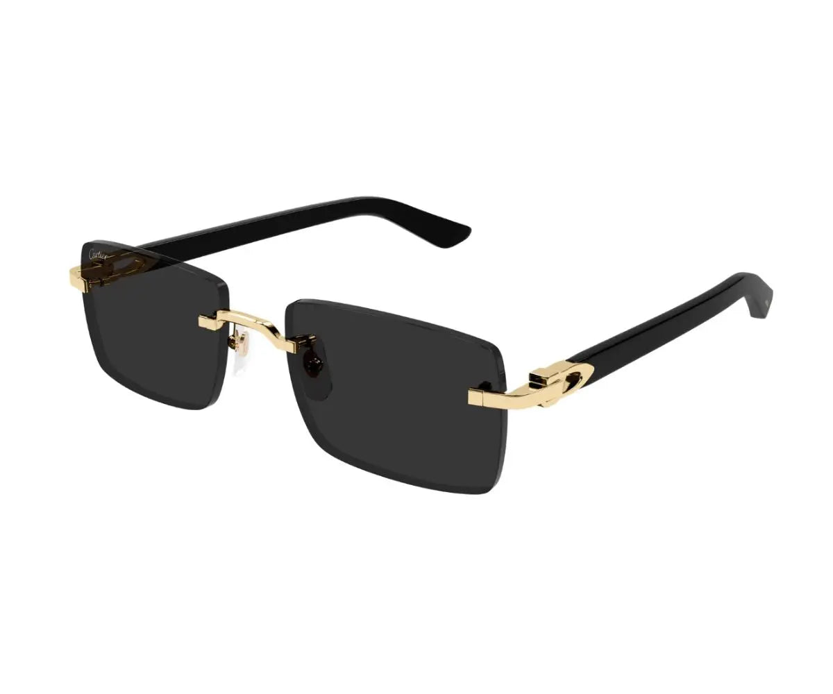 Sunglasses with black lenses and gold frames on a white background