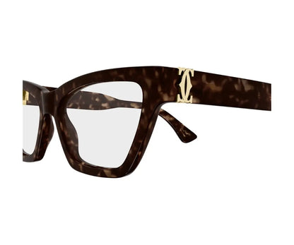 Tortoiseshell glasses with gold accents on a white background
