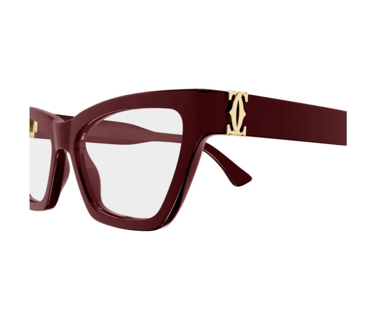 Maroon glasses with gold accents on a white background