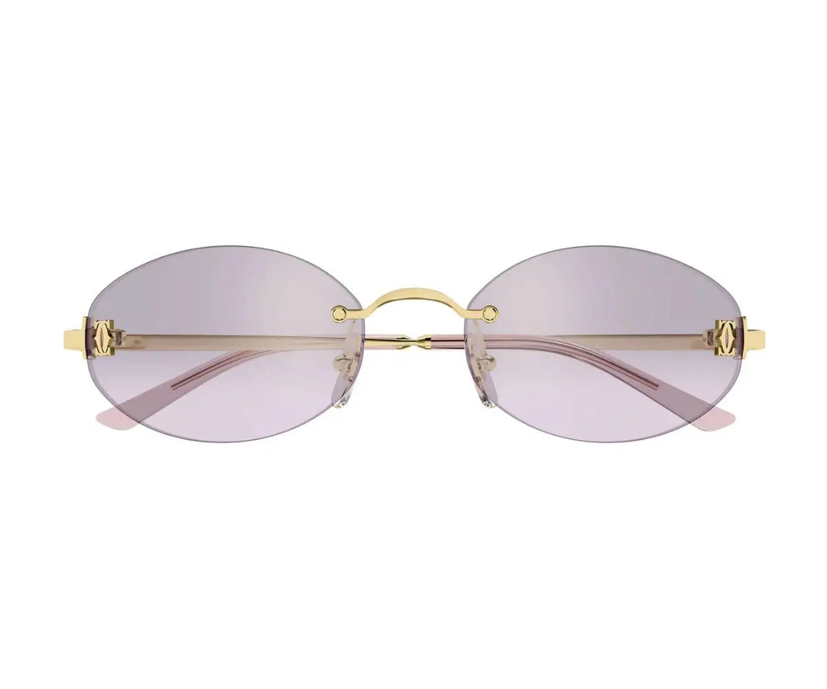 Gold-framed sunglasses with pink lenses on a white background