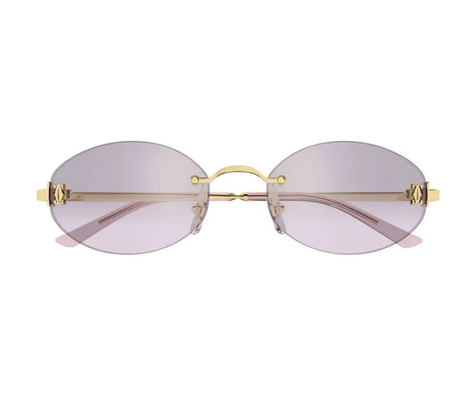 Gold-framed sunglasses with pink lenses on a white background