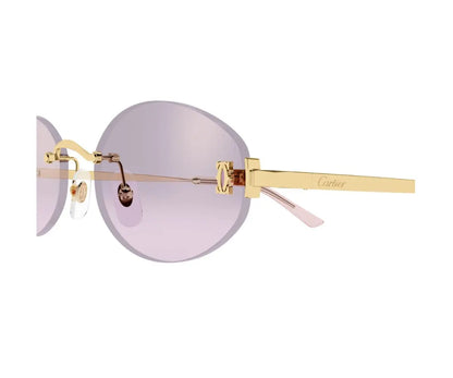 Gold-framed sunglasses with pink lenses on a white background