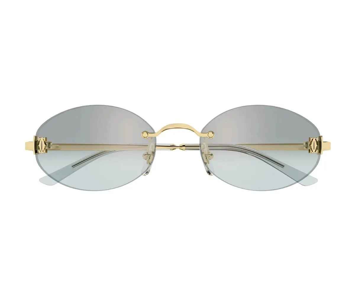 Gold-framed sunglasses with clear lenses on a white background