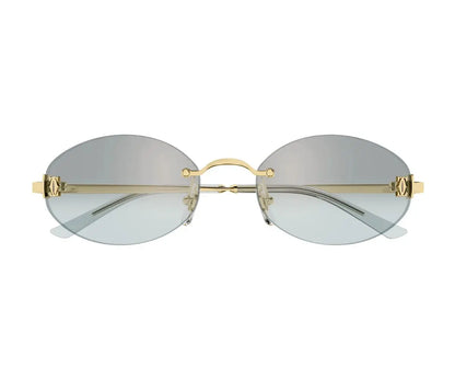 Gold-framed sunglasses with clear lenses on a white background