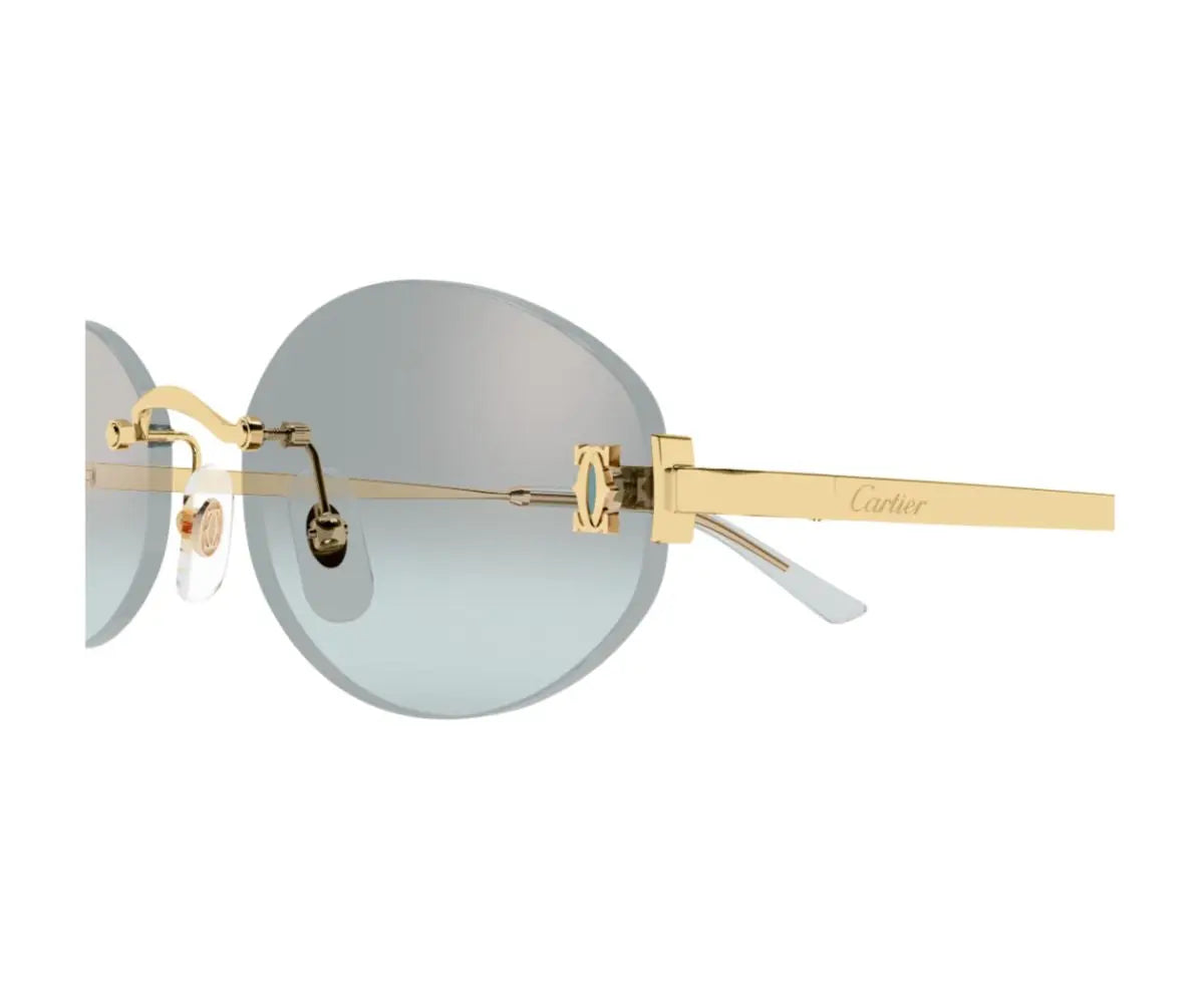 Gold-framed sunglasses with round lenses on a white background