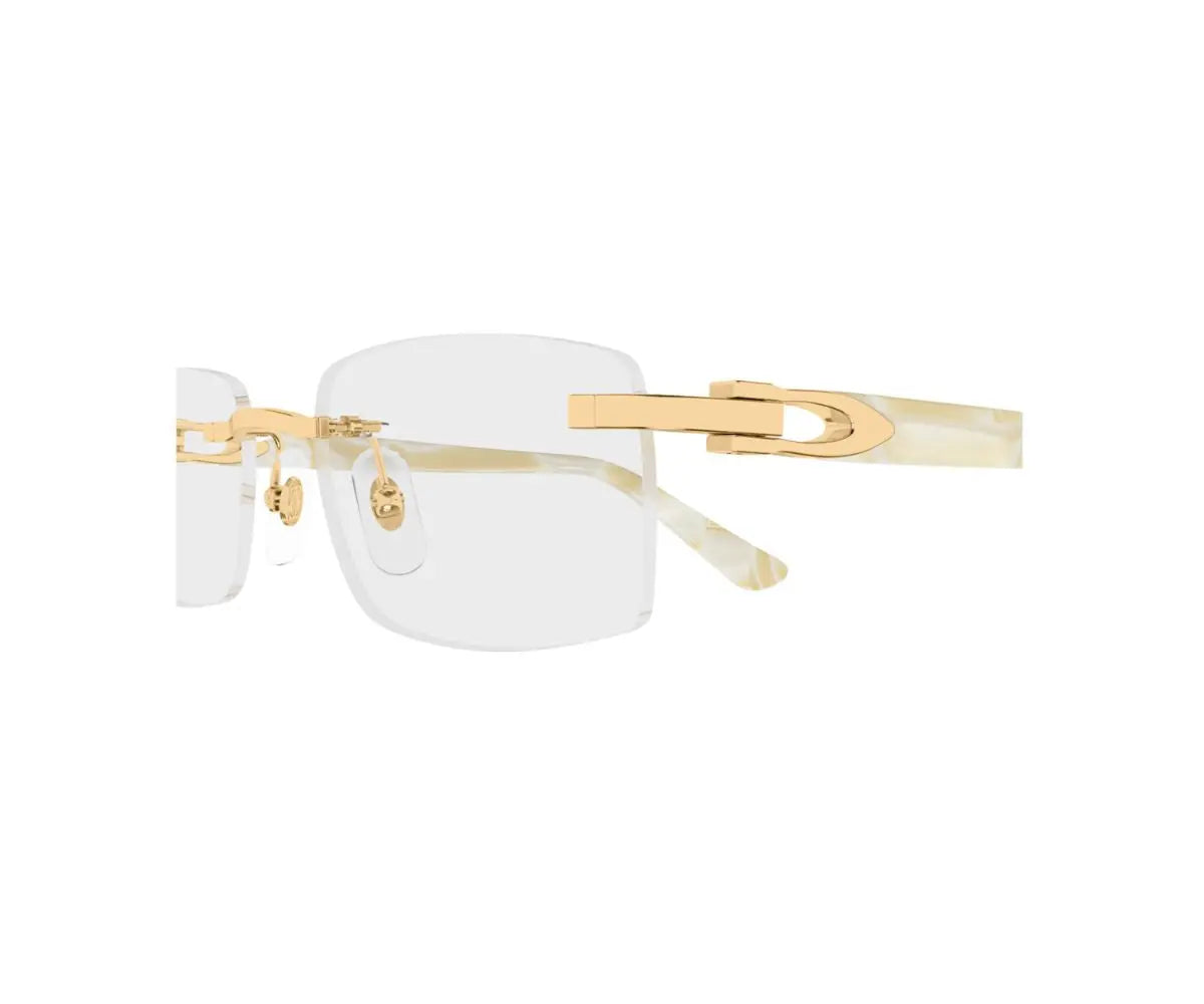 Gold-rimmed eyeglasses on a white background