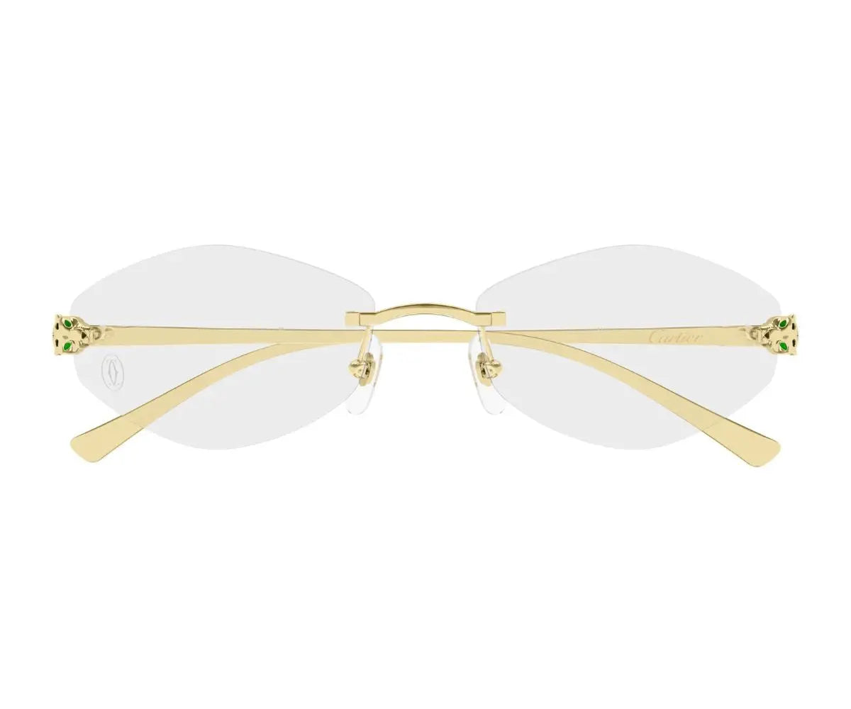 Gold-framed eyeglasses with white lenses on a white background