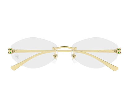 Gold-framed eyeglasses with white lenses on a white background