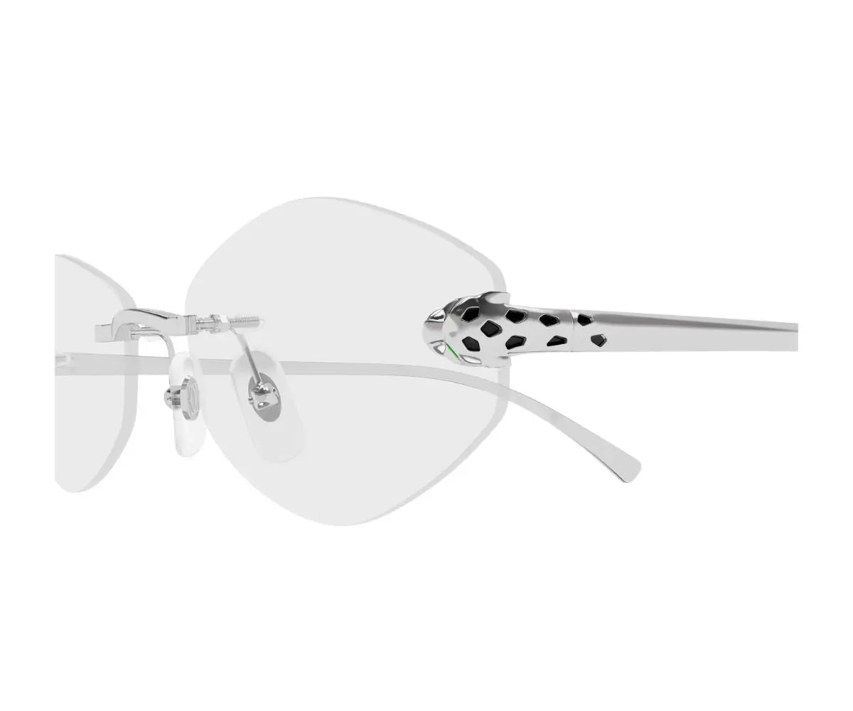 Sunglasses with white lenses and black polka dot arms on a white background
