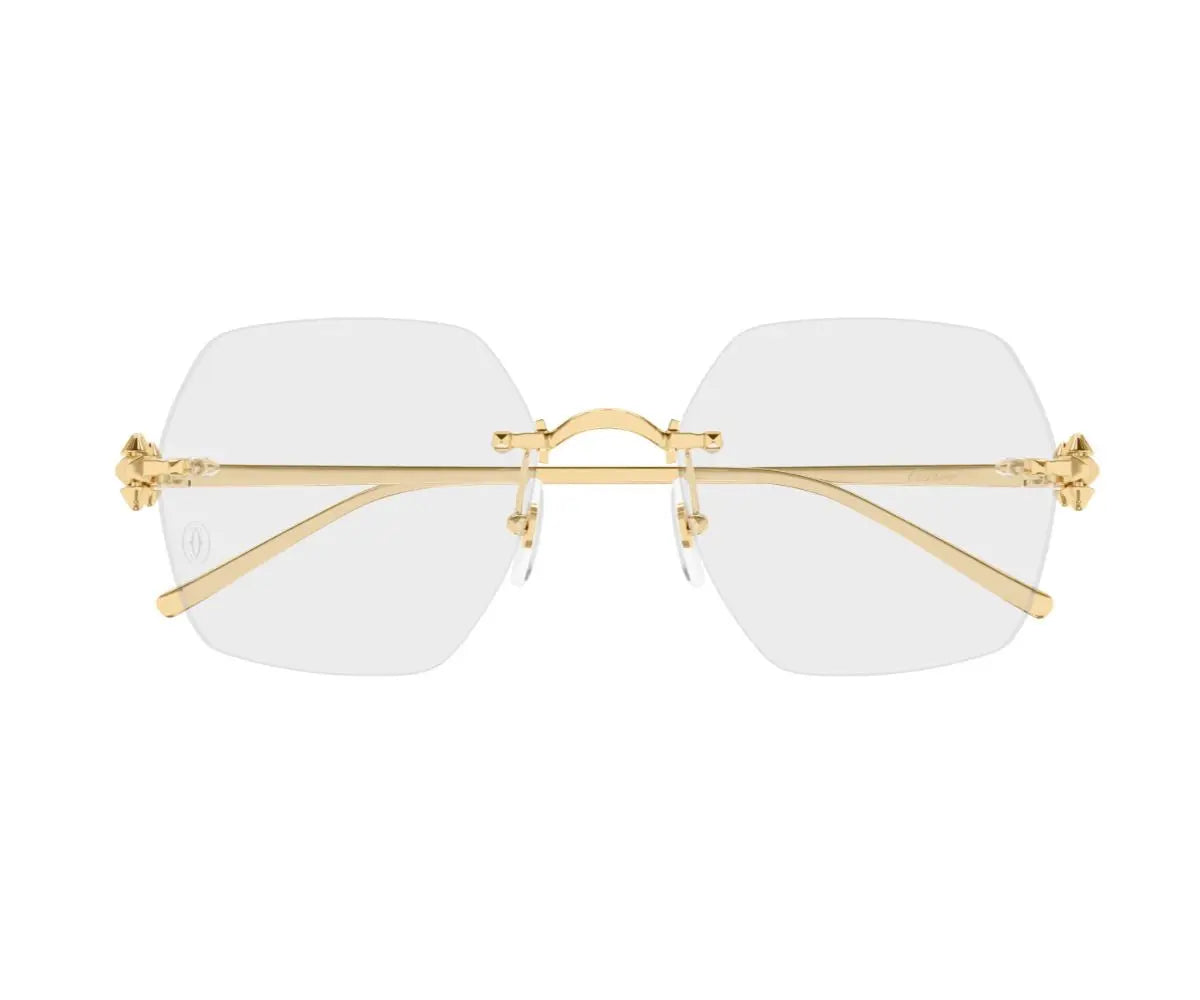 Gold-framed eyeglasses with white lenses on a white background