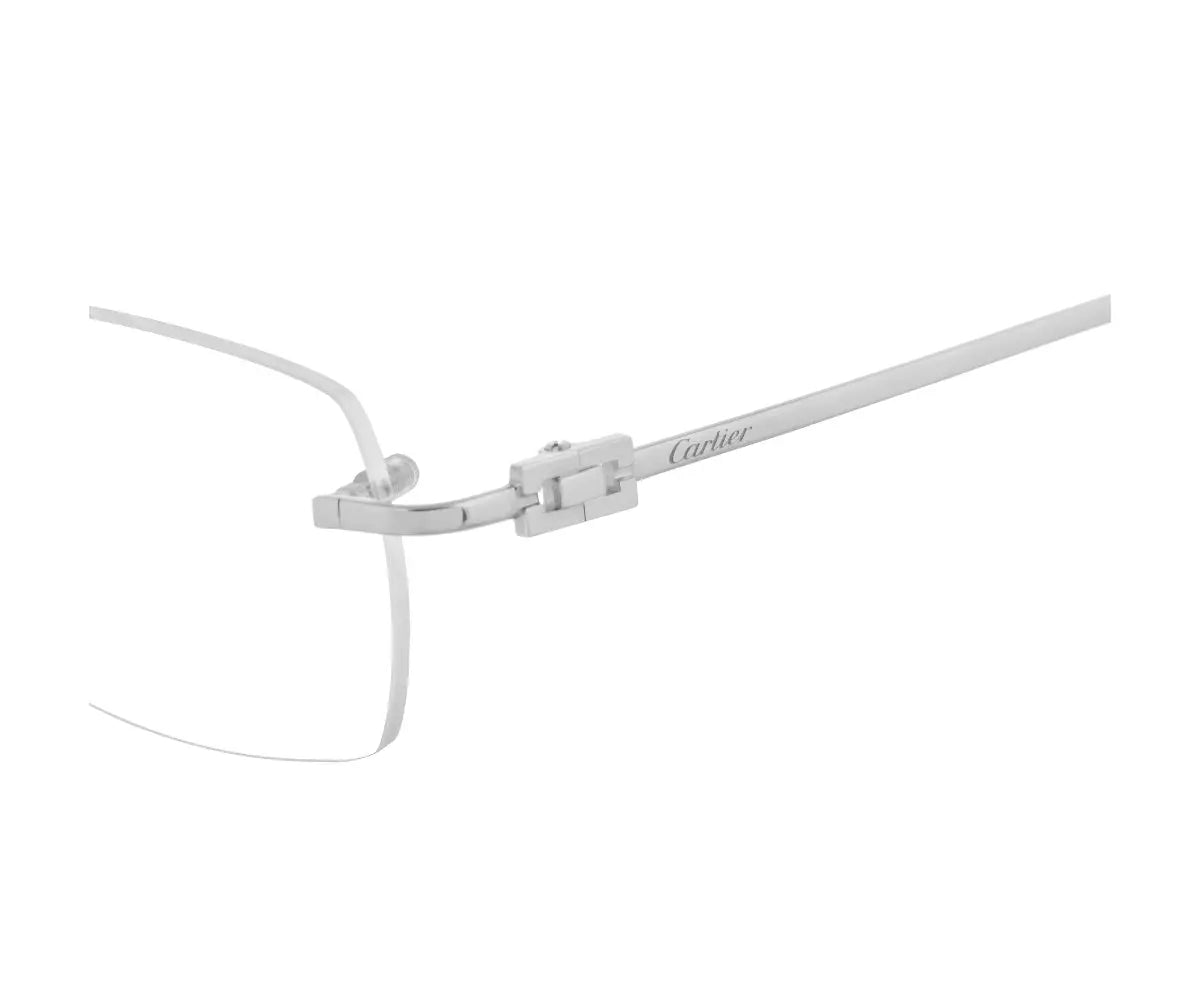 Silver eyeglasses with 'Cartier' branding on a white background