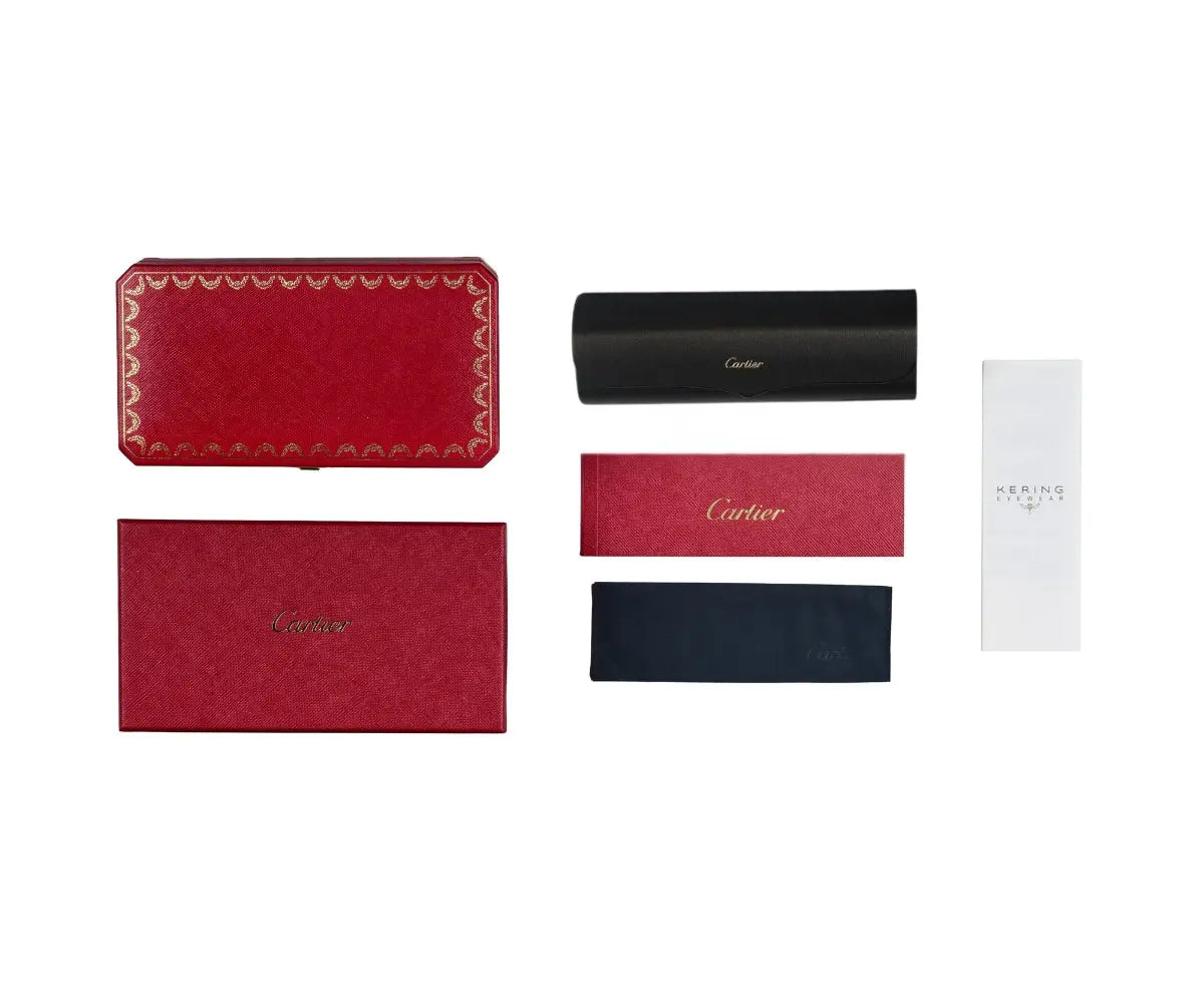 Collection of Cartier products including a red wallet, black case, and white box on a white background.