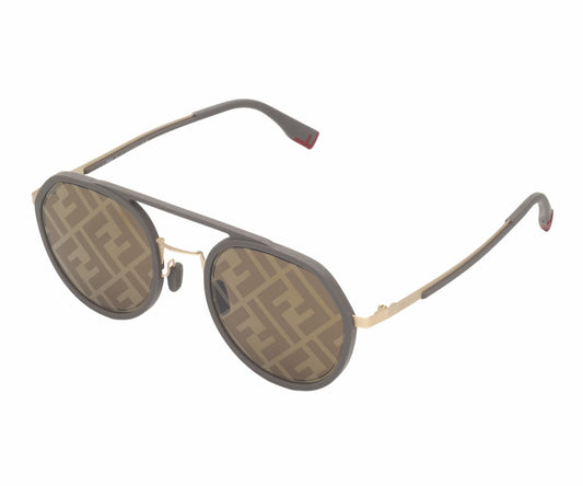 Sunglasses with a distinctive pattern on the lenses against a white background