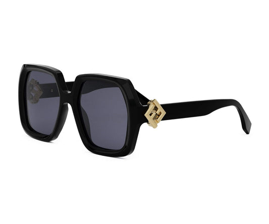 Black sunglasses with gold accents on a white background