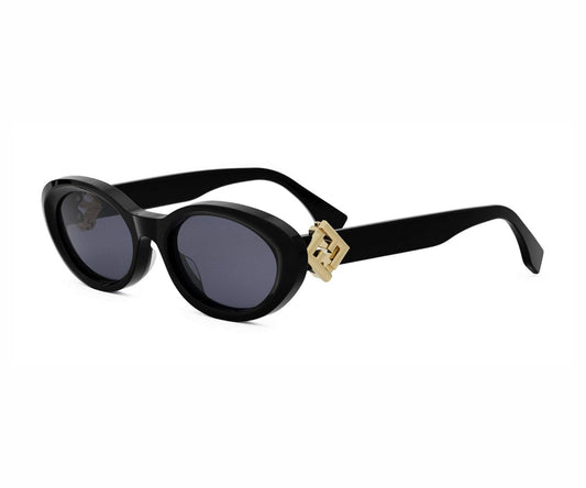 Black sunglasses with gold accents on a white background