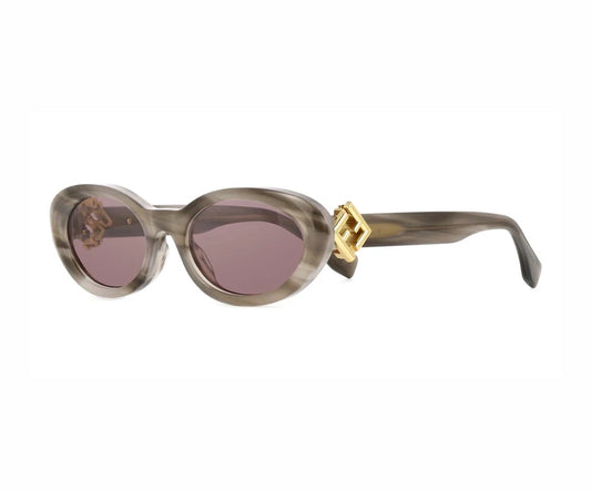 Sunglasses with a gold accent on a white background