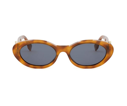 Sunglasses with tortoiseshell frame and dark lenses on a white background