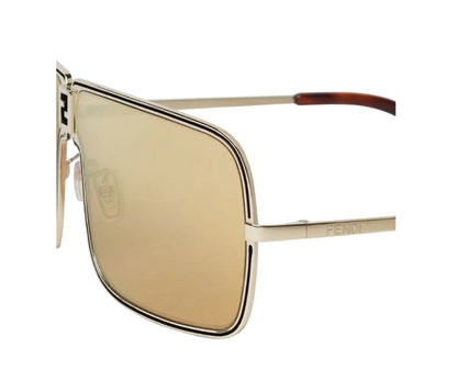 Gold-framed sunglasses with a white background